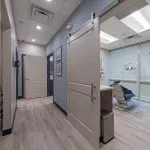Office hallway looking into an exam room