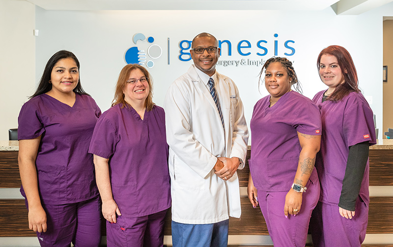 Dr. Antoine Johnson with staff